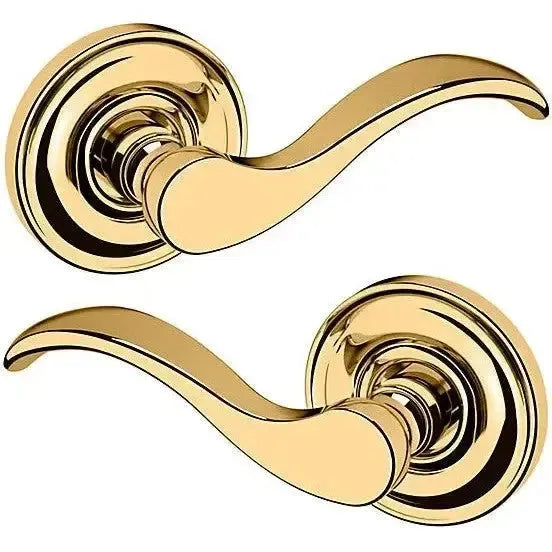 Baldwin 5455V Wave Lever with 5048 Rosette in Lifetime Polished Brass finish