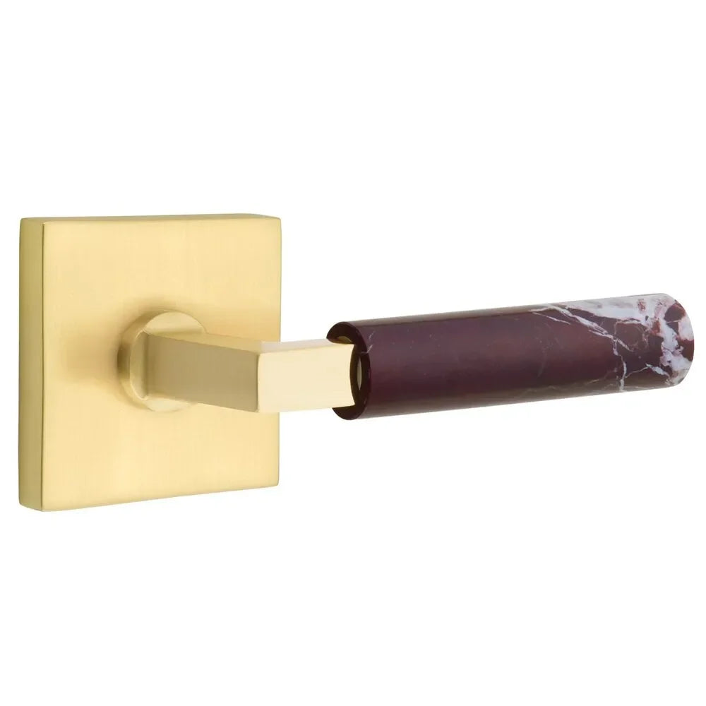 The Emtek Select L-Square Rosso Levanto Marble Lever with Square Rosette in Satin Brass finish.