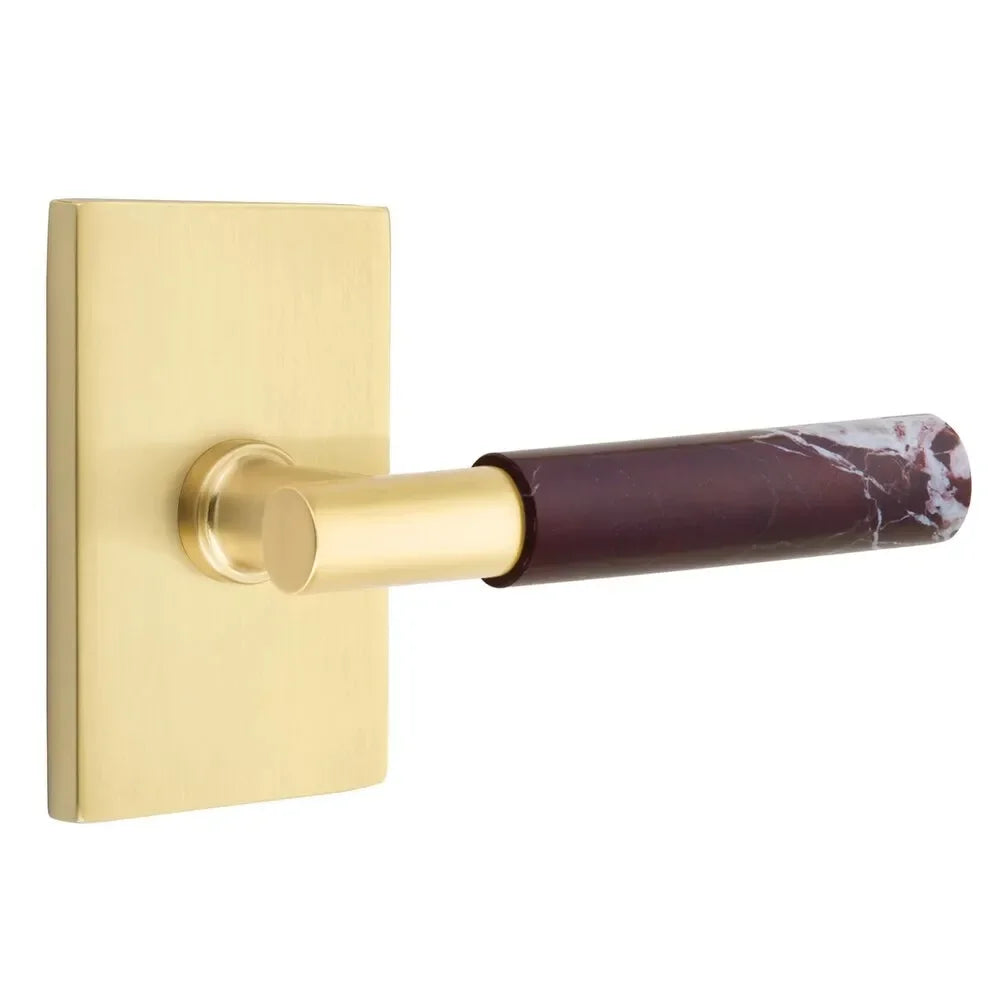 The Emtek Select T-Bar Rosso Levanto Marble Lever with Modern Rectangular Rosette in Satin Brass finish.