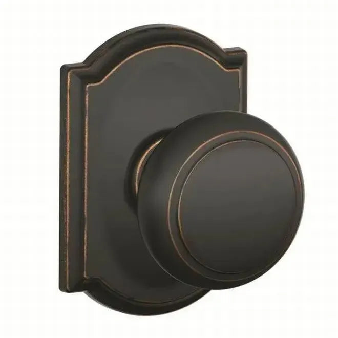 Schlage Andover Knob with Camelot Rosette in Aged Bronze finish