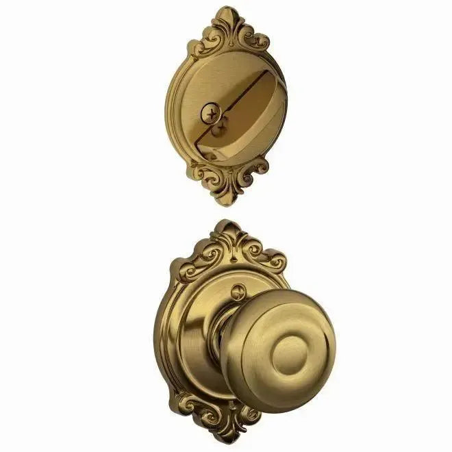 Schlage Georgian Knob With Brookshire Rosette Interior Active Trim - Exterior Handleset Sold Separately in Antique Brass finish