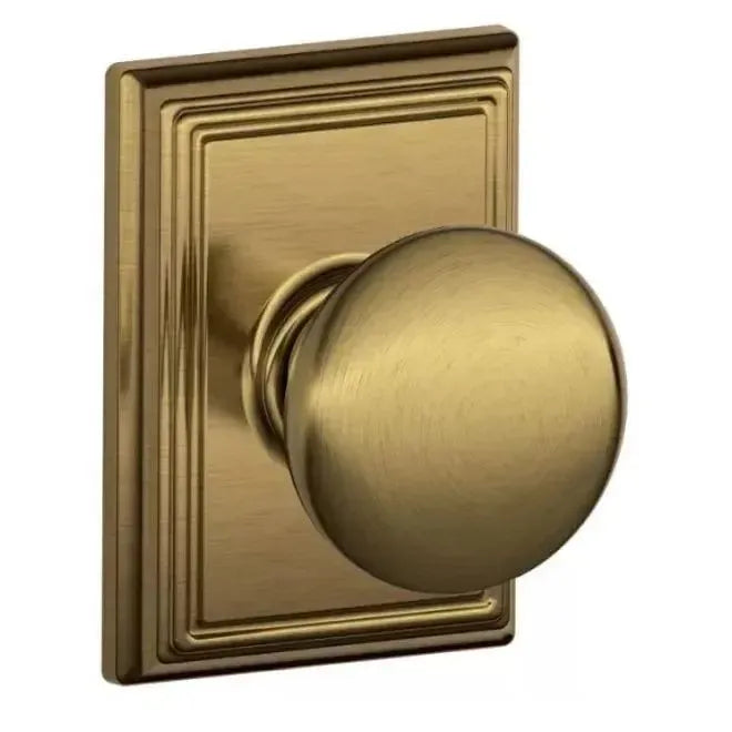 Schlage Plymouth Knob with Addison Rosette in Antique Brass finish