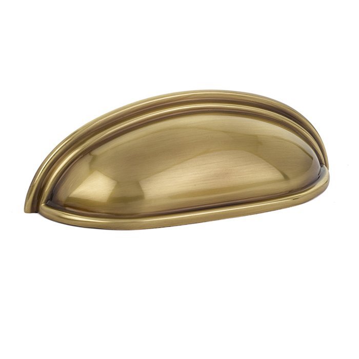 The Emtek Cup Cabinet Pull in French Antique finish.