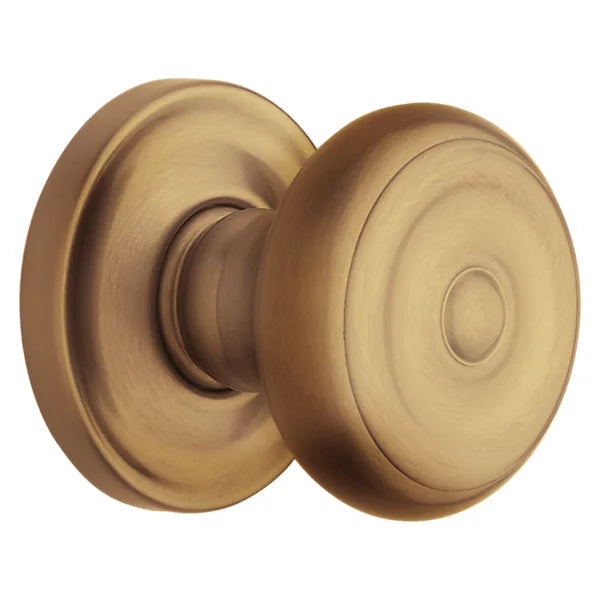 Baldwin Estate 5020 Half Dummy Knob with 5048 Rose in Vintage Brass finish