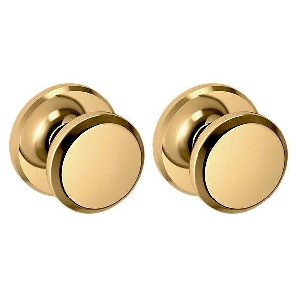 Baldwin Estate 5023 Passage Knob with R016 Rose in Unlacquered Brass finish