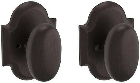 Baldwin Estate 5024 Privacy Knob with R030 Rosette in Venetian Bronze finish