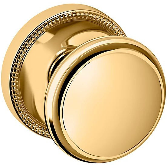 Baldwin Estate 5069 Half Dummy Knob with 5076 Rosette in Lifetime Polished Brass finish