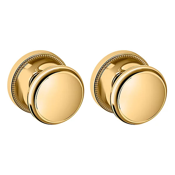 Baldwin Estate 5069 Passage Knob with 5076 Rose in Unlacquered Brass finish