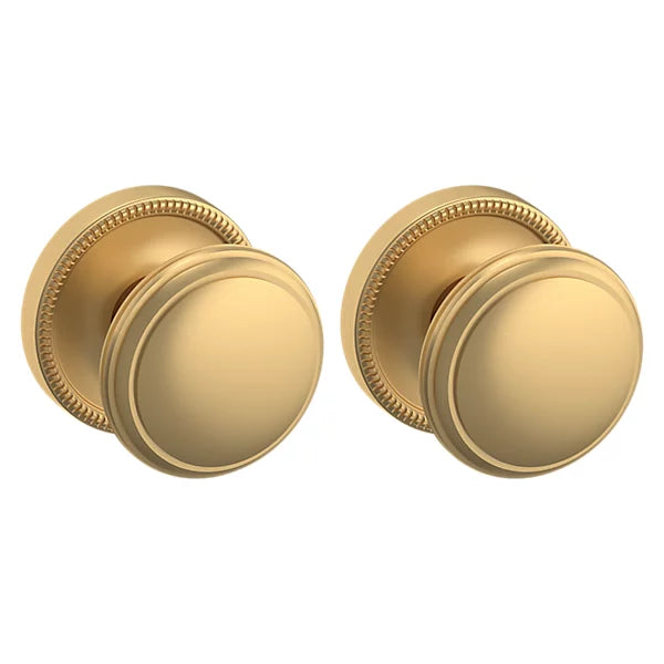 Baldwin Estate 5069 Passage Knob with 5076 Rose in Vintage Brass finish