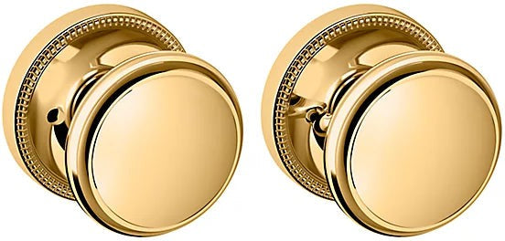 Baldwin Estate 5069 Privacy Knob with 5076 Rosette in Unlacquered Brass finish