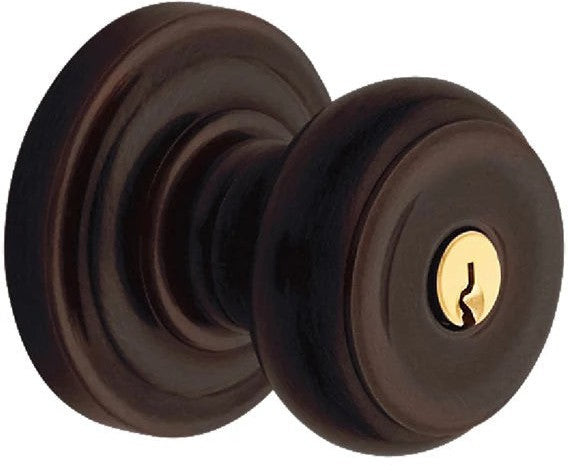 Baldwin Estate 5210 Keyed Colonial Knob with Classic Rosette in Venetian Bronze finish