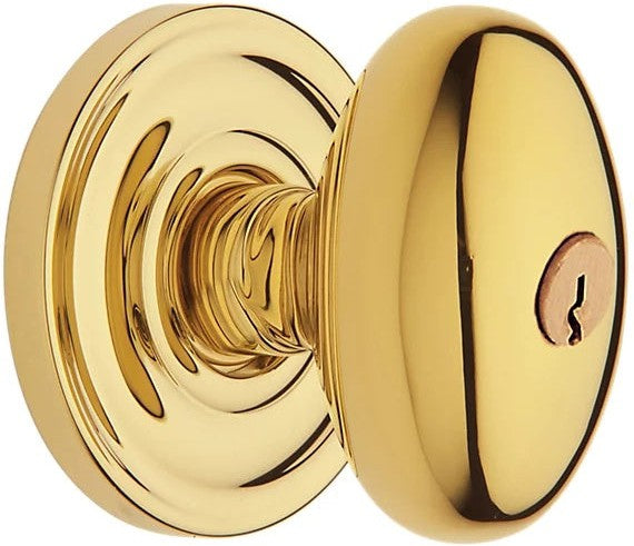 Baldwin Estate 5225 Keyed Egg Knob with Classic Rosette in Unlacquered Brass finish