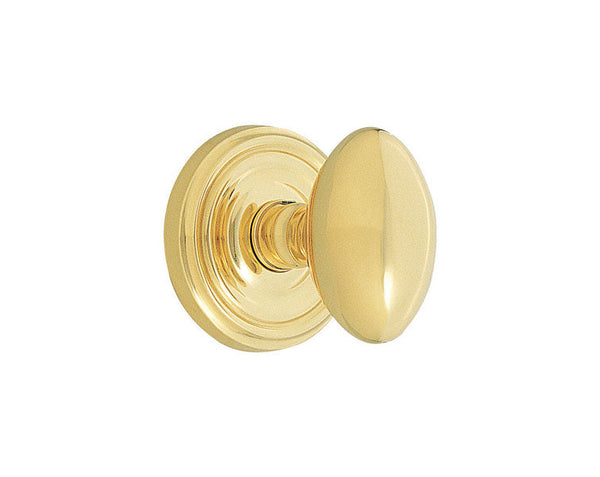 Emtek Concealed Privacy Egg Knob With Regular Rosette in Unlacquered Brass finish