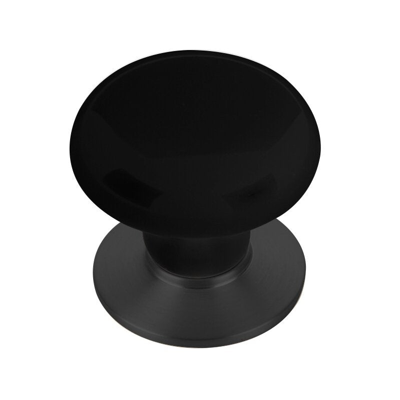 The Emtek Ebony Porcelain Cabinet Knob in Flat Black finish