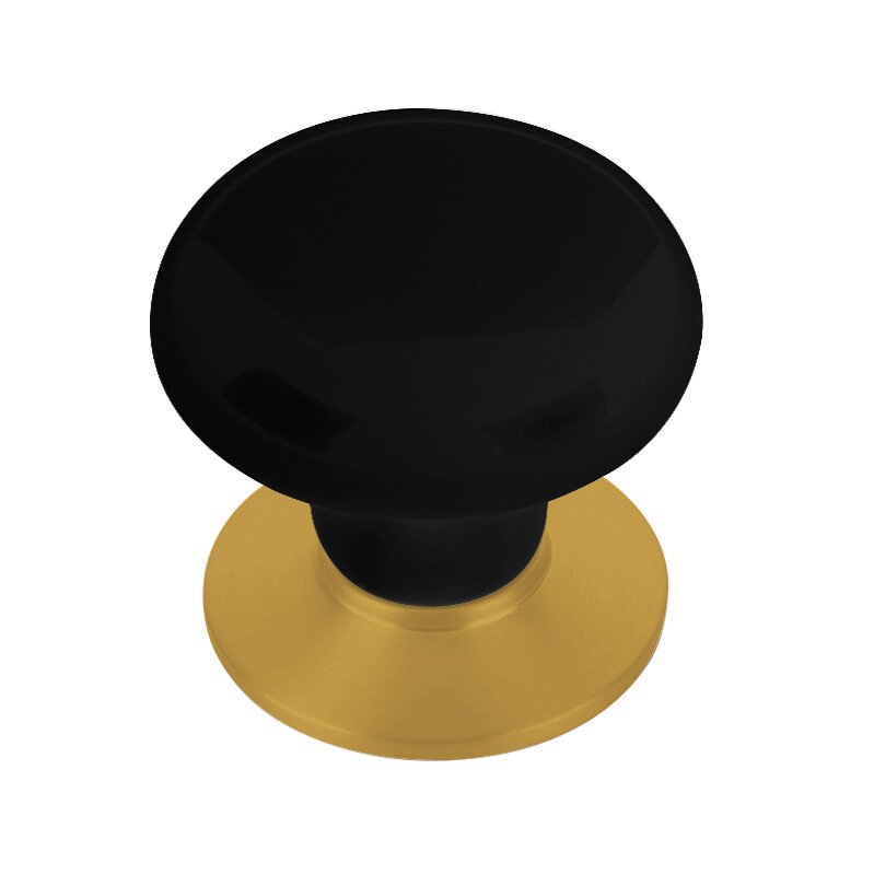 The Emtek Ebony Porcelain Cabinet Knob in French Antique finish