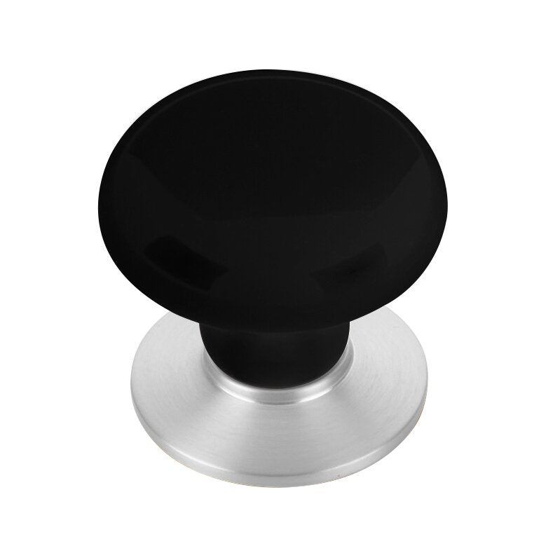 The Emtek Ebony Porcelain Cabinet Knob in Polished Chrome finish