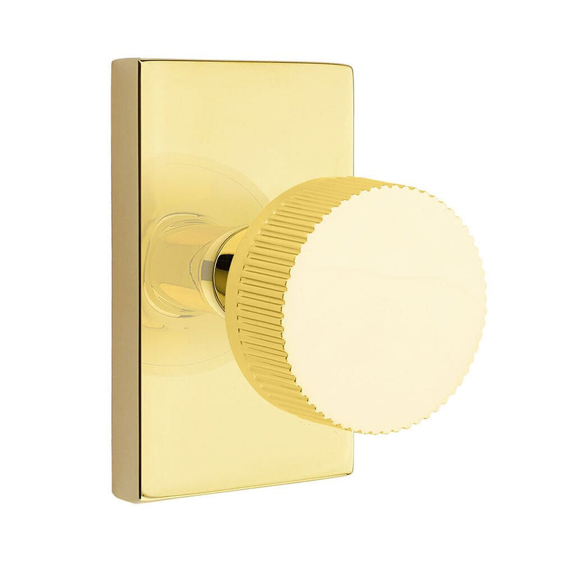 Emtek Passage Select Conical Straight Knurled Knob with Modern Rectangular Rosette in Unlacquered Brass finish