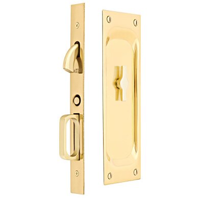 The Emtek Privacy Classic Pocket Door Mortise Lock in Unlacquered Brass finish