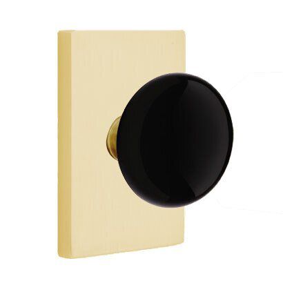 Emtek Privacy Ebony Porcelain Knob With Modern Rectangular Rosette in Satin Brass finish