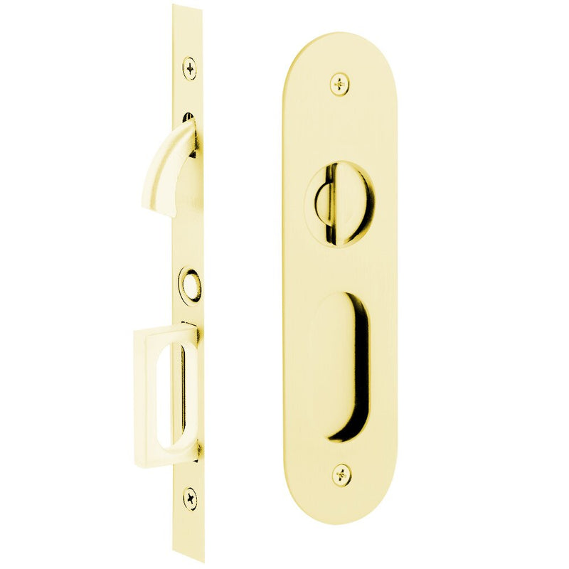 Emtek Privacy Narrow Oval Pocket Door Mortise Lock in Unlacquered Brass finish