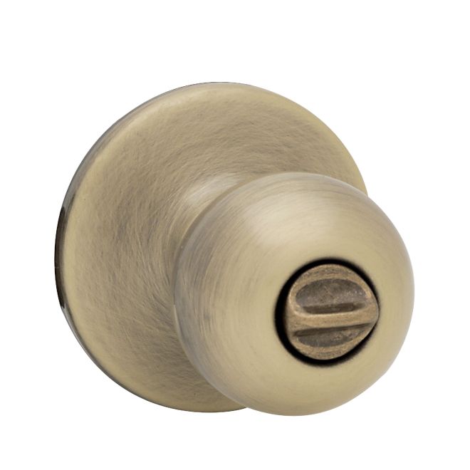 Kwikset Polo Privacy Door Knob in Antique Brass finish