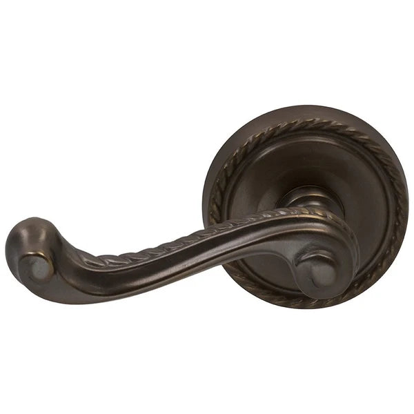 The Omnia Traditions 570 Lever with Round Rosette in Antique Bronze, Unlacquered finish