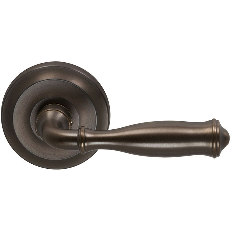 Omnia Traditions 944 Lever with Round Rosette in Antique Bronze, Unlacquered finish