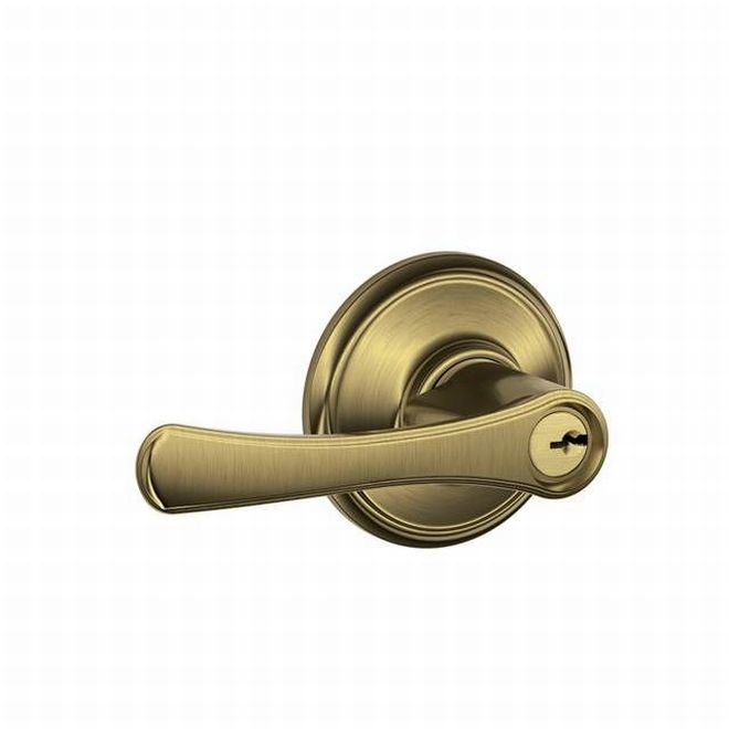 Schlage Avila Lever Storeroom Lock in Antique Brass finish