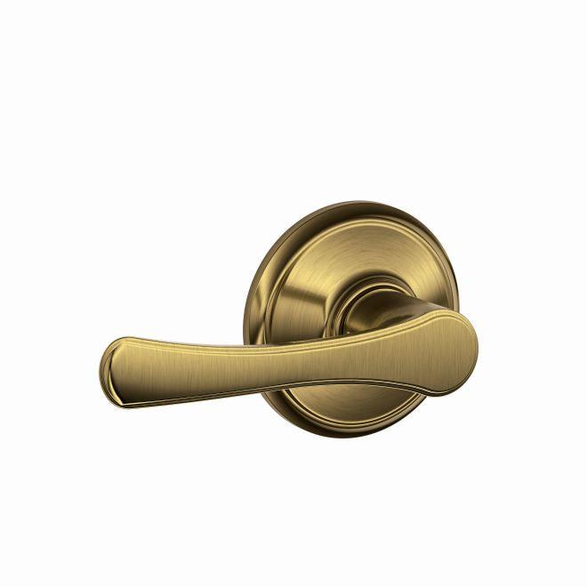 Schlage Avila Passage Lever in Antique Brass finish