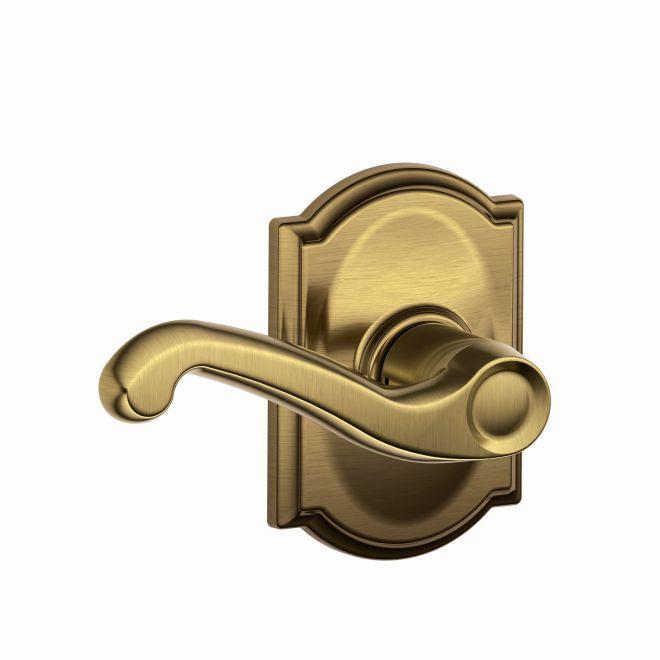 Schlage Flair Passage Lever With Camelot Rosette in Antique Brass finish