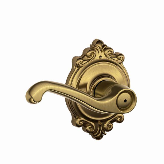 Schlage Flair Privacy Lever With Brookshire Rosette in Antique Brass finish