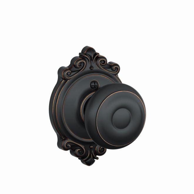 Schlage Georgian Knob Half Dummy With Brookshire Rosette in Aged Bronze finish