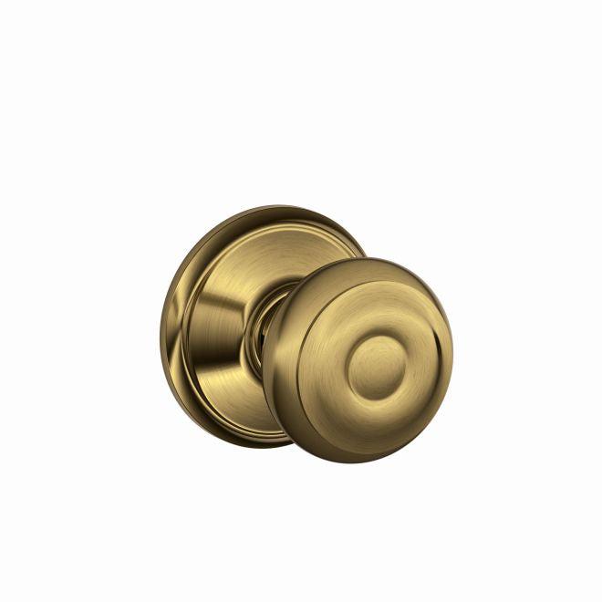 Schlage Georgian Passage Knob in Antique Brass finish