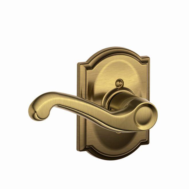 Schlage Left Hand Flair Lever With Camelot Rosette Half Dummy in Antique Brass finish