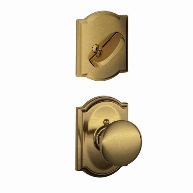 Schlage Plymouth Knob With Camelot Rosette Interior Active Trim - Exterior Handleset Sold Separately in Antique Brass finish