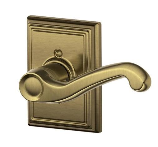 Schlage Right Hand Flair Lever With Addison Rosette Half Dummy in Antique Brass finish