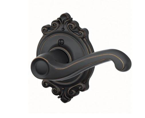 Schlage Right Hand Flair Lever With Brookshire Rosette Half Dummy in Aged Bronze finish