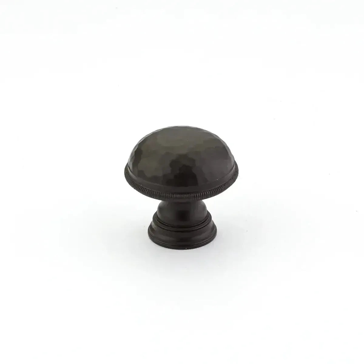 The Schaub Atherton Hammered Knurled Edge Cabinet Knob in Oil Rubbed Bronze finish.