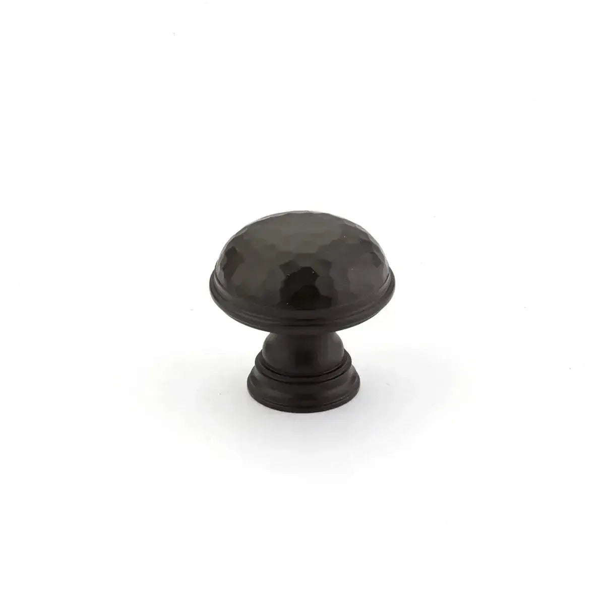 The Schaub Atherton Hammered Plain Edge Cabinet Knob in Oil Rubbed Bronze finish.