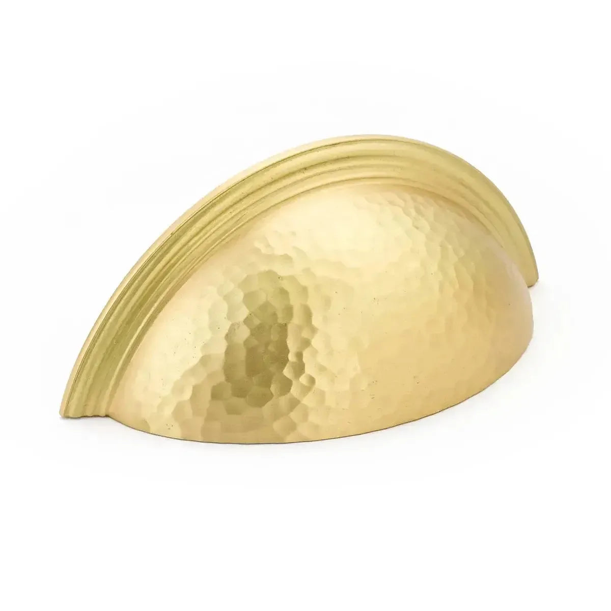 The Schaub Atherton Hammered Plain Edge Cup Pull in Satin Brass finish.