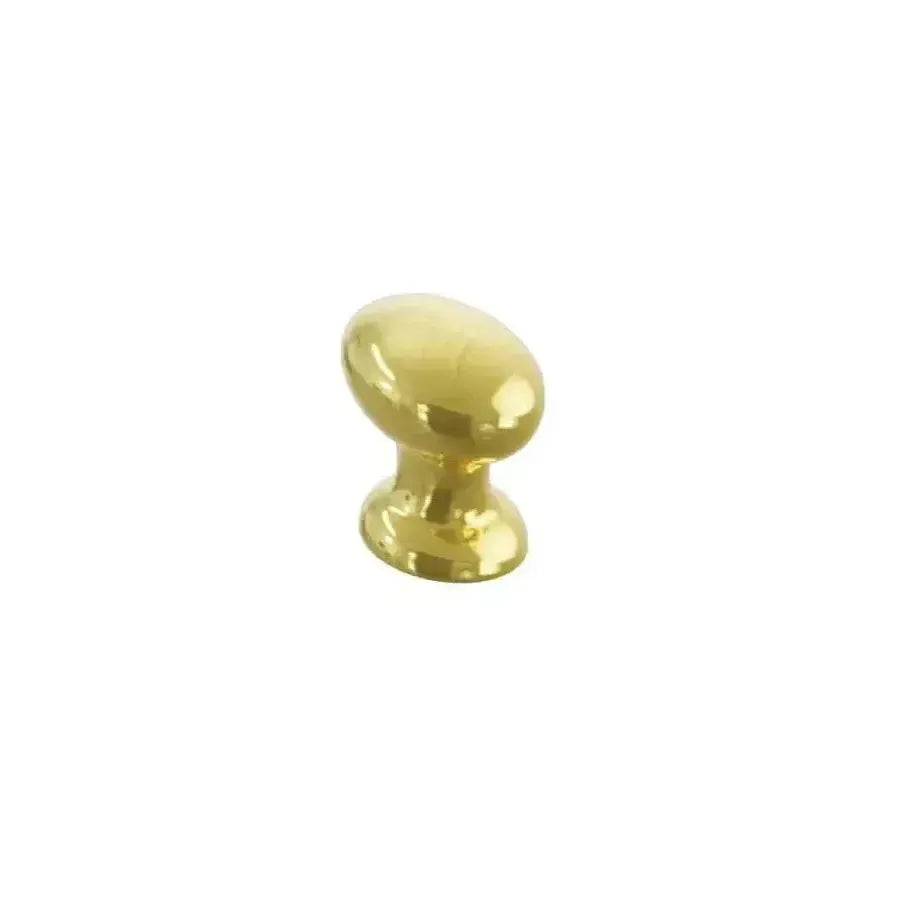 The Schaub Avenue Oval Cabinet Knob in Unlacquered Brass finish.