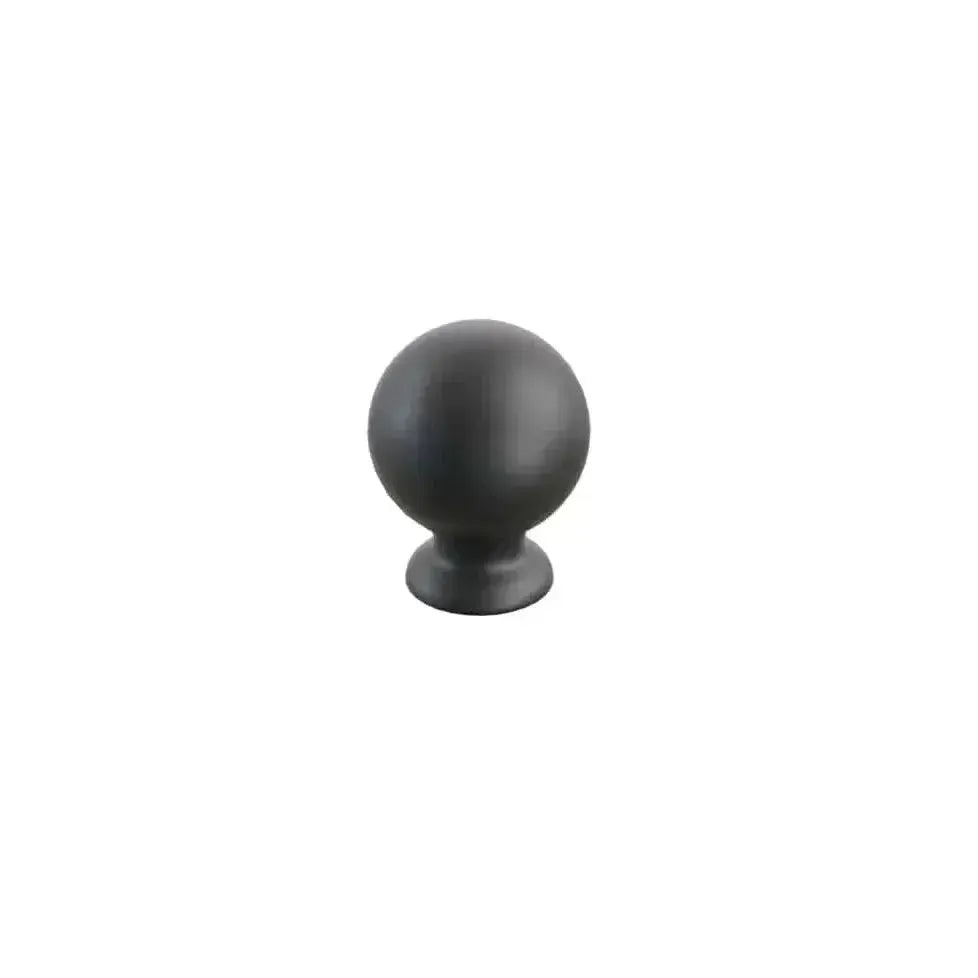 The Schaub Avenue Round Cabinet Knob in Matte Black finish.