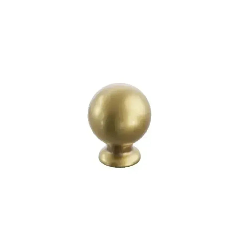 The Schaub Avenue Round Cabinet Knob in Satin Brass finish.