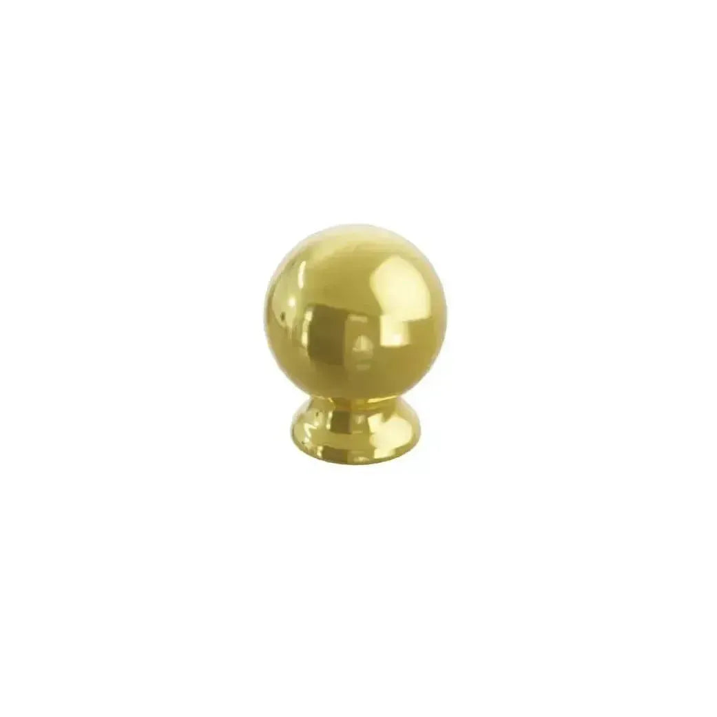 The Schaub Avenue Round Cabinet Knob in Unlacquered Brass finish.
