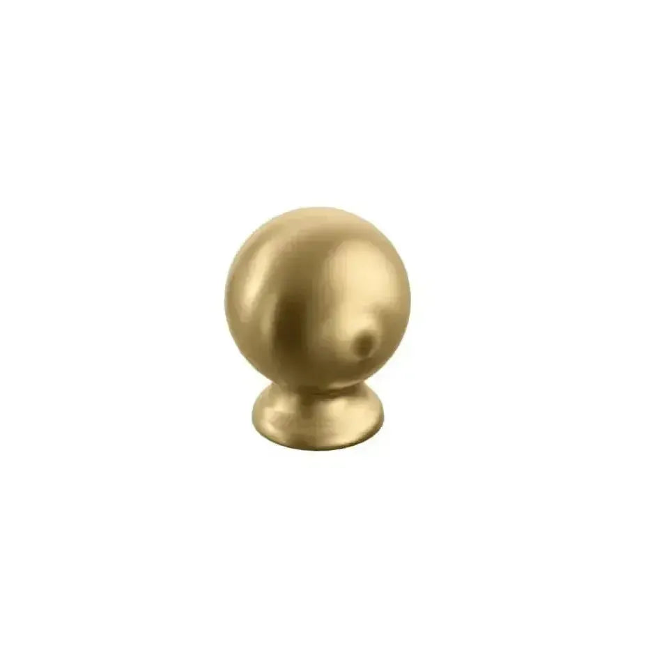 The Schaub Avenue Round Cabinet Knob in Vintage Brass finish.