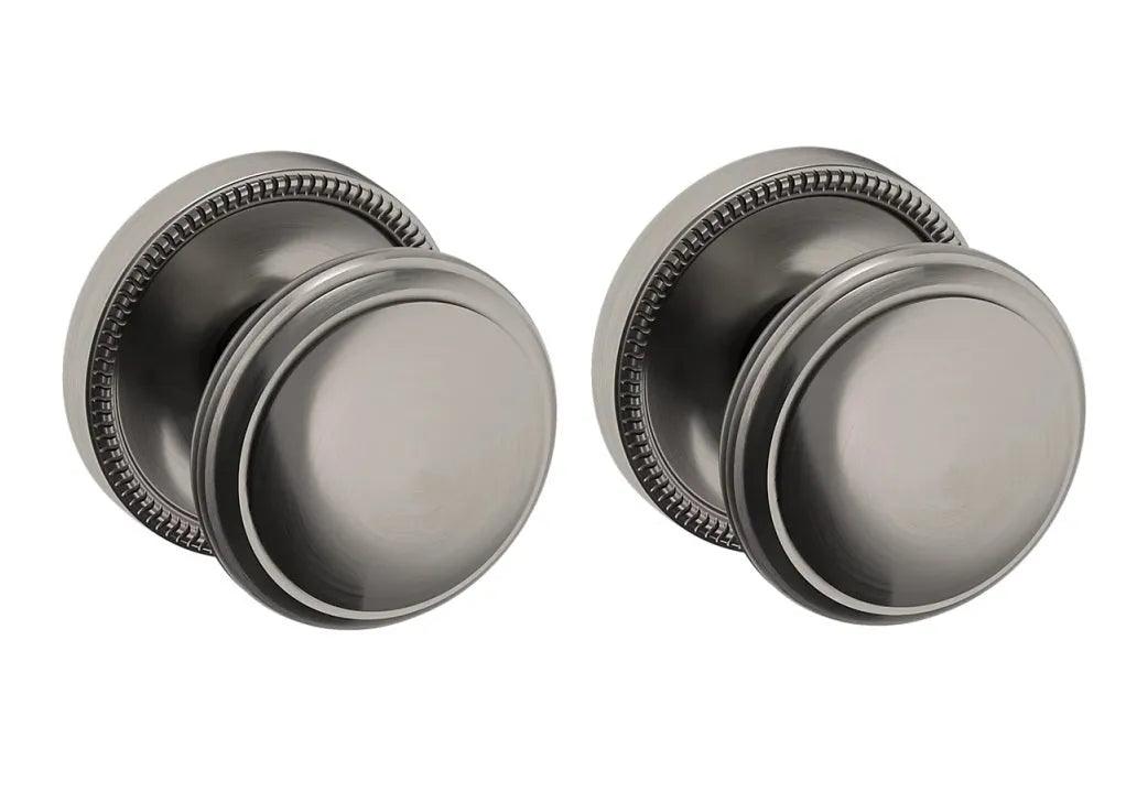 The Baldwin Estate 5069 Knob with 5076 Rosette in Graphite Nickel finish.
