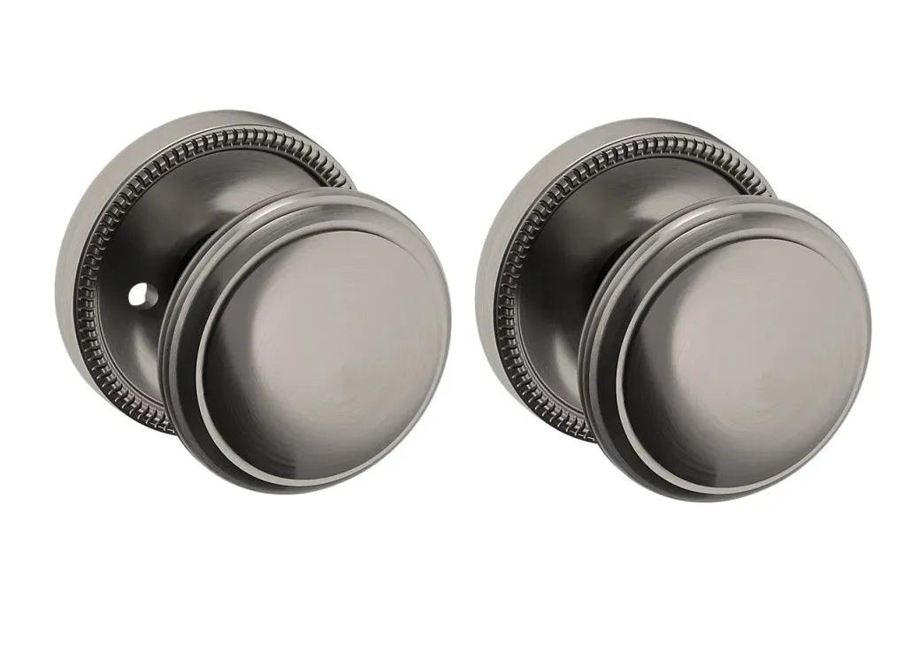 The Baldwin Estate 5069 Knob with 5076 Rosette in Graphite Nickel finish.