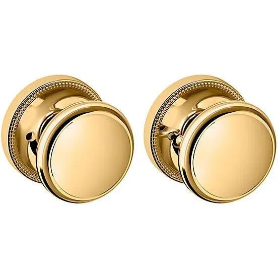 Baldwin Estate 5069 Privacy Knob with 5076 Rosette in Lifetime Polished Brass finish