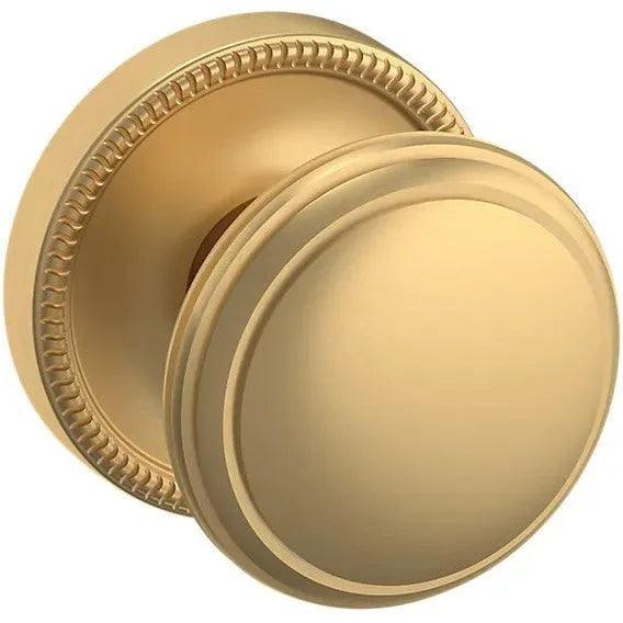 Baldwin Estate 5069 Half Dummy Knob with 5076 Rosette in Vintage Brass finish