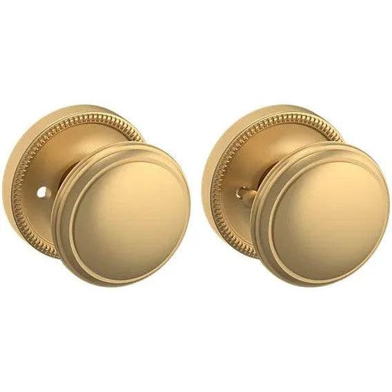 Baldwin Estate 5069 Privacy Knob with 5076 Rosette in Vintage Brass finish